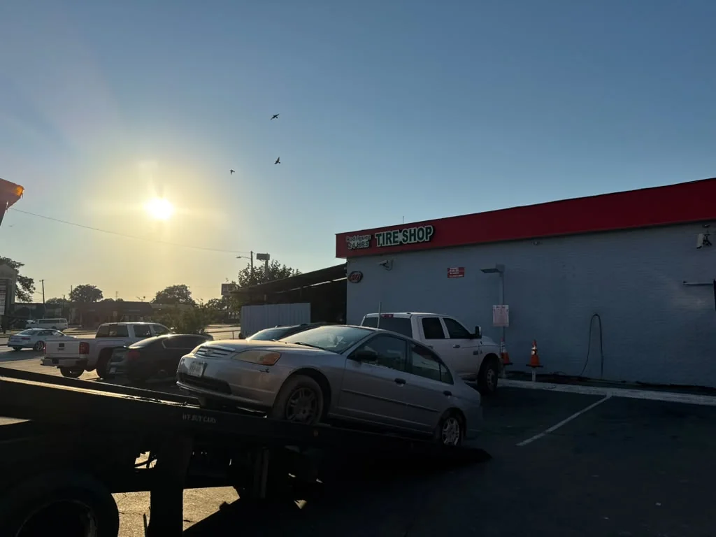 Fuel Delivery Service Dallas TX - 24/7 Emergency Gas Delivery Roadside Fuel delivery service driver assisting stranded motorist in Dallas TX